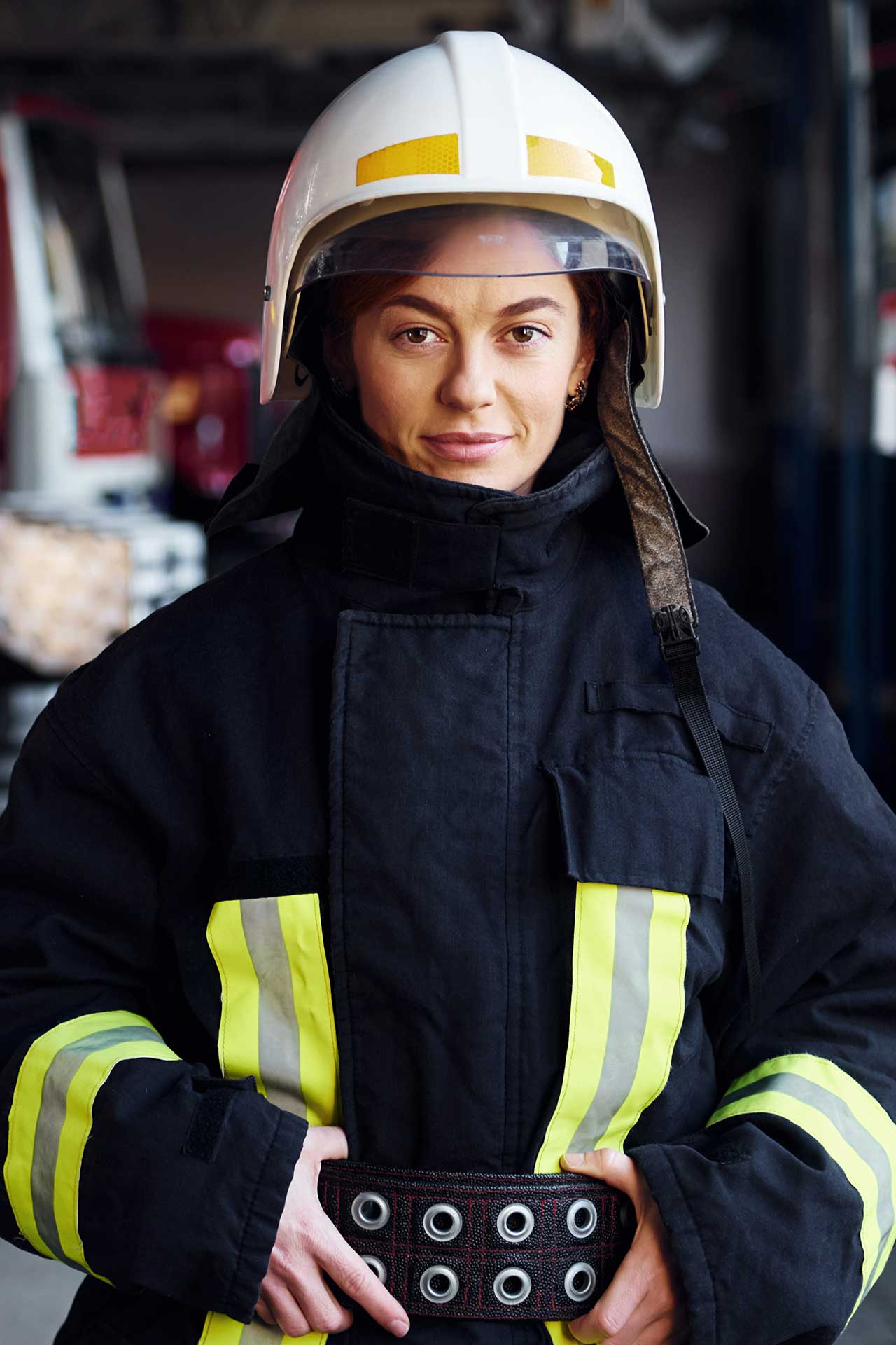 female-firefighter-in-protective-uniform-standing-2023-11-27-05-02-05-utc.jpg