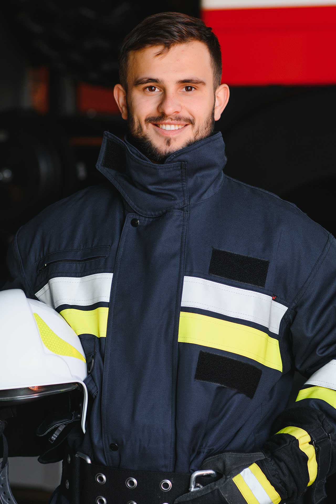 fireman-firefighter-in-action-standing-near-a-fi-2023-11-27-05-35-26-utc.jpg